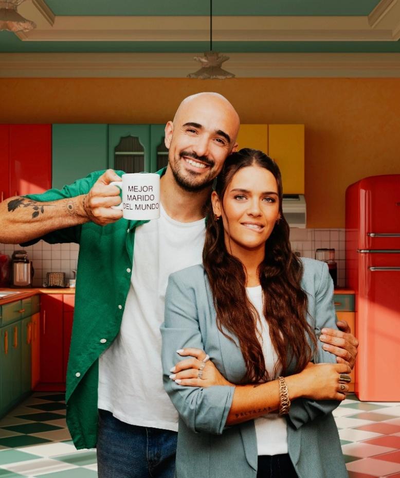 A person and person posing for a picture
AI-generated content may be incorrect.